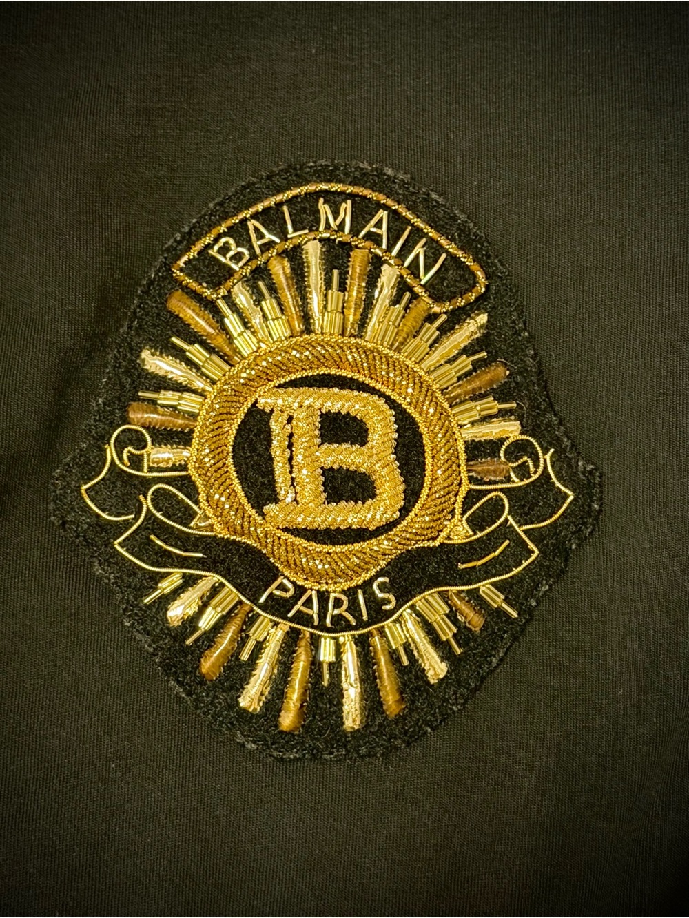 Balmain Black Bomber Jacket with Gold Embroidered Crest Patch